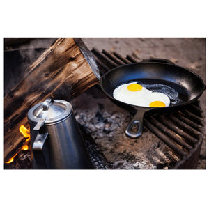 cooking breakfast while camping
